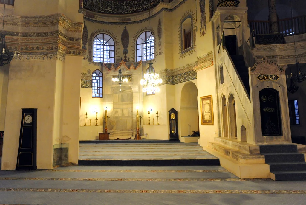The interior of Little Hagia Sophia, with the mihrab, the minbar and the carpeted prayer floor