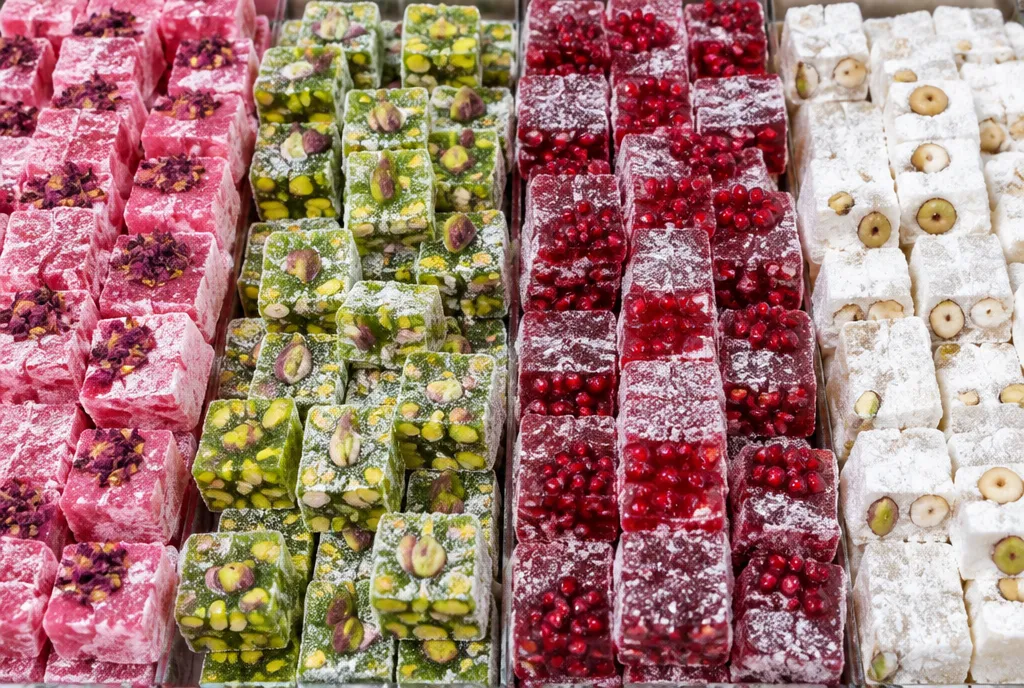 Rows of Turkish delight in rose, pistachio and pomegranate