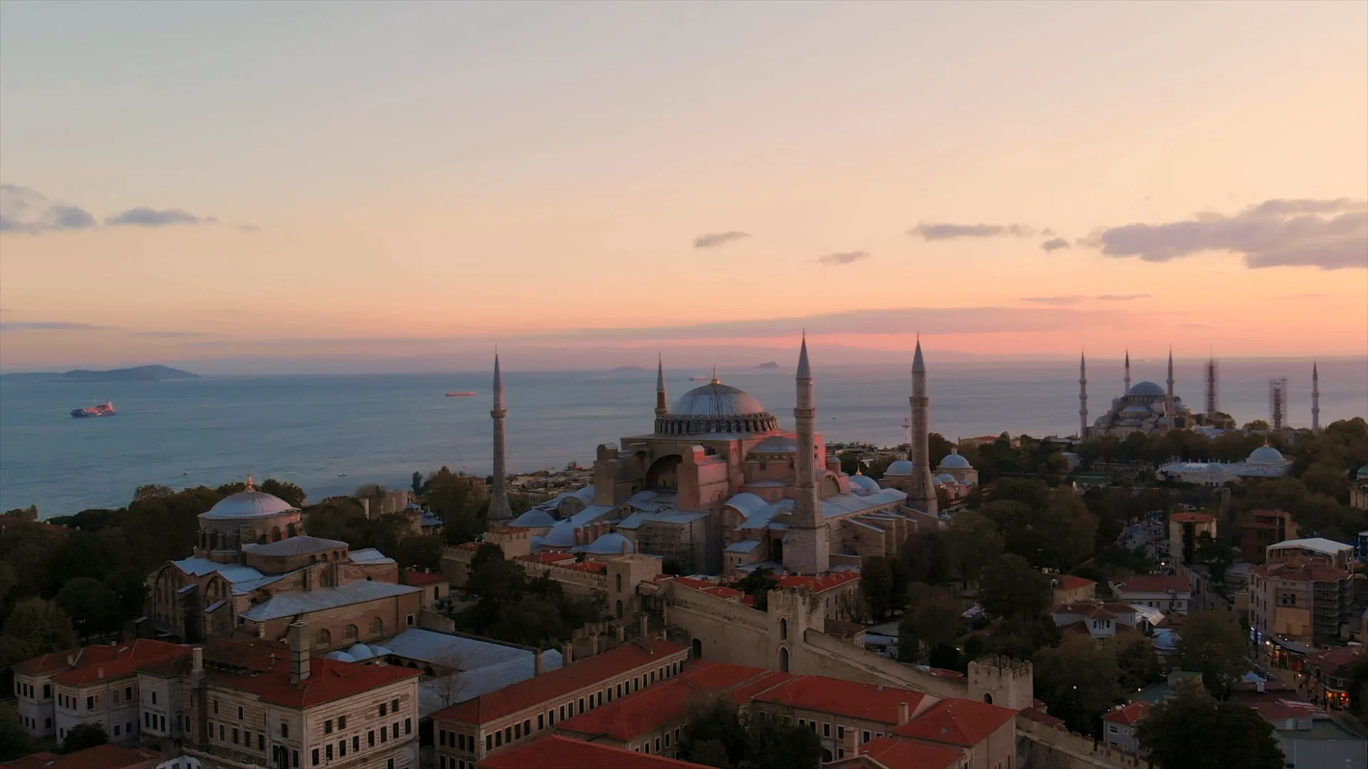 Aerial view of Hagia Sophia and the Istanbul skyline at sunset, minutes from Turna Hotel